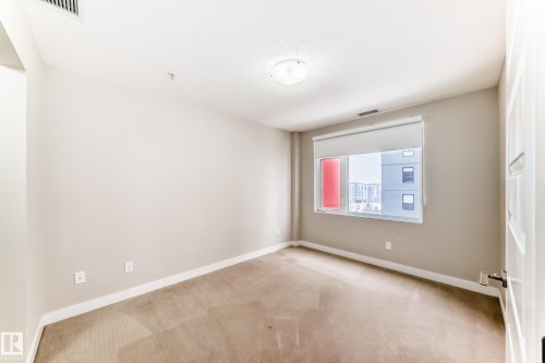711 5151 Windermere Boulevard, Edmonton, AB - Indoor Photo Showing Other Room