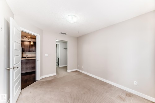 711 5151 Windermere Boulevard, Edmonton, AB - Indoor Photo Showing Other Room