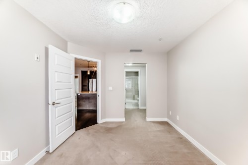 711 5151 Windermere Boulevard, Edmonton, AB - Indoor Photo Showing Other Room