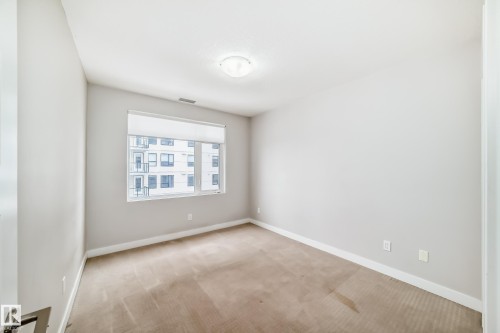 711 5151 Windermere Boulevard, Edmonton, AB - Indoor Photo Showing Other Room