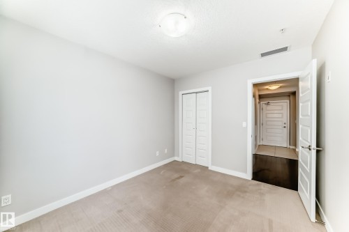 711 5151 Windermere Boulevard, Edmonton, AB - Indoor Photo Showing Other Room