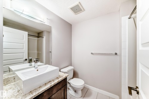 711 5151 Windermere Boulevard, Edmonton, AB - Indoor Photo Showing Bathroom
