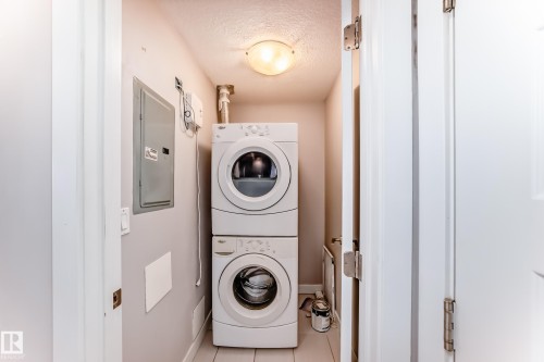 711 5151 Windermere Boulevard, Edmonton, AB - Indoor Photo Showing Laundry Room