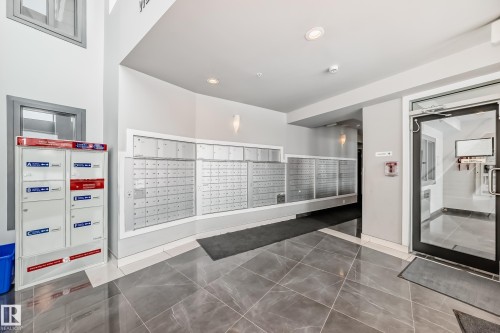 711 5151 Windermere Boulevard, Edmonton, AB - Indoor Photo Showing Other Room