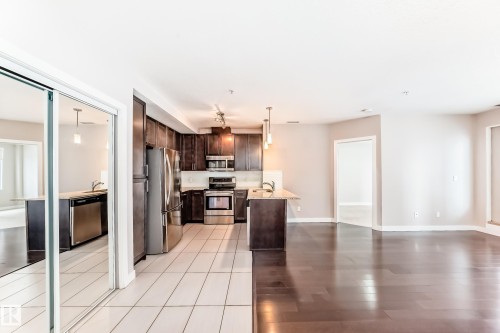 711 5151 Windermere Boulevard, Edmonton, AB - Indoor Photo Showing Kitchen