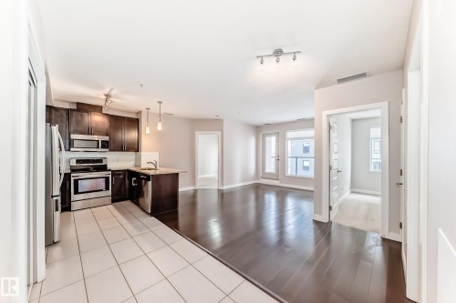 711 5151 Windermere Boulevard, Edmonton, AB - Indoor Photo Showing Kitchen