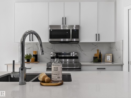 5546 Kootook Road, Edmonton, AB - Indoor Photo Showing Kitchen With Double Sink With Upgraded Kitchen