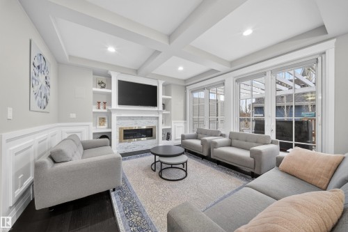 9037 24 Avenue, Edmonton, AB - Indoor Photo Showing Living Room With Fireplace