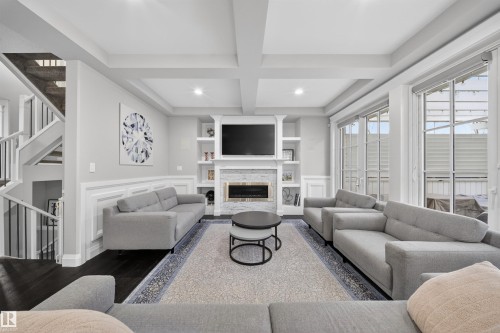 9037 24 Avenue, Edmonton, AB - Indoor Photo Showing Living Room With Fireplace