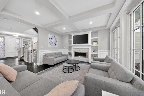 9037 24 Avenue, Edmonton, AB - Indoor Photo Showing Living Room With Fireplace
