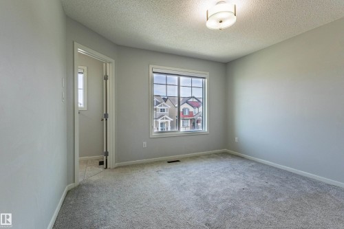 210 Desrochers Boulevard, Edmonton, AB - Indoor Photo Showing Other Room