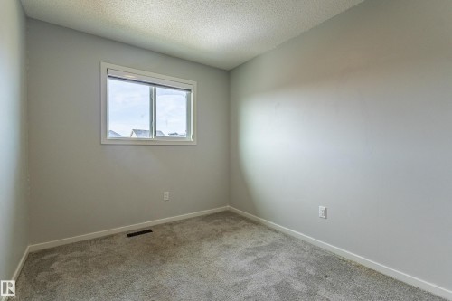 210 Desrochers Boulevard, Edmonton, AB - Indoor Photo Showing Other Room