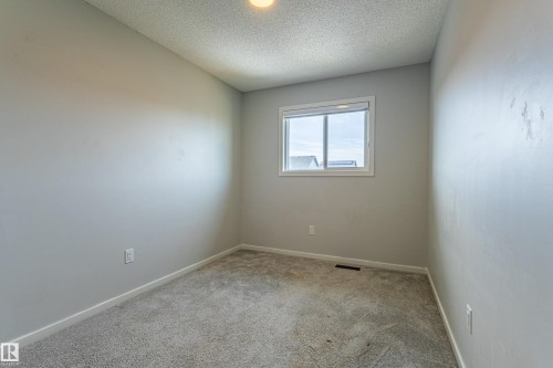 210 Desrochers Boulevard, Edmonton, AB - Indoor Photo Showing Other Room