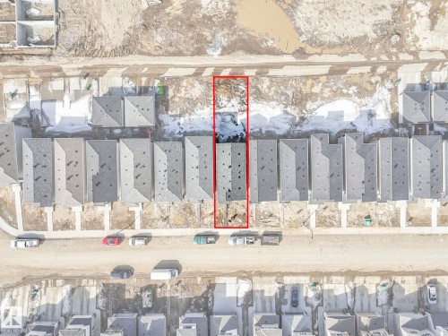 Aerial Site Plan. Outlining the boundaries of the property within a developed area - 275 Munn Way, Leduc, AB - Other