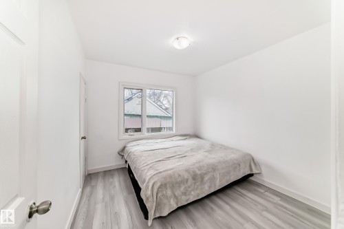 9221 110 Avenue, Edmonton, AB - Indoor Photo Showing Bedroom