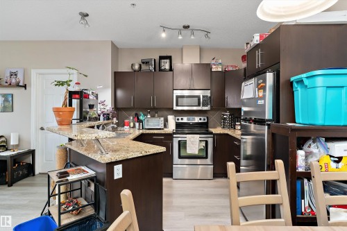 213 263 Macewan Road, Edmonton, AB - Indoor Photo Showing Kitchen With Stainless Steel Kitchen