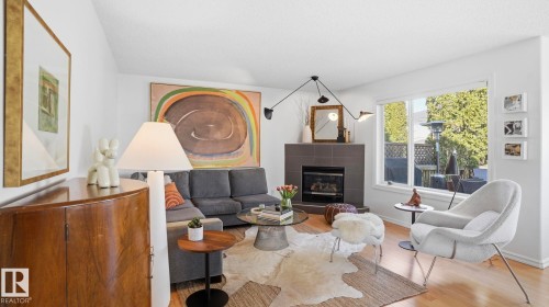 11816 13 Avenue, Edmonton, AB - Indoor Photo Showing Living Room With Fireplace