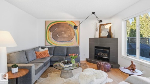 11816 13 Avenue, Edmonton, AB - Indoor Photo Showing Living Room With Fireplace