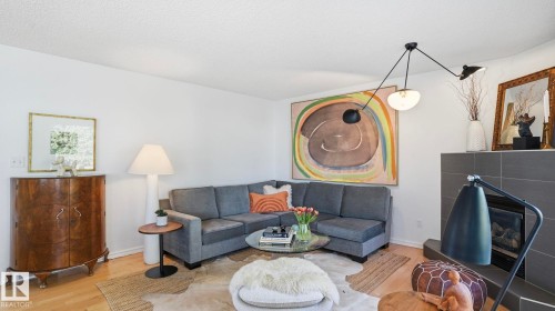 11816 13 Avenue, Edmonton, AB - Indoor Photo Showing Living Room With Fireplace