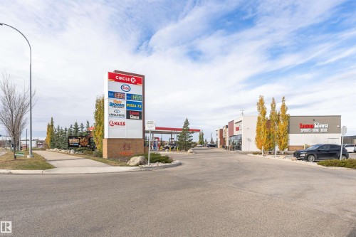 The property is located within a commercial development featuring a Circle K gas station and a variety of businesses, including Brown's Social House and Pizza 73 - 3435 Keswick Boulevard, Edmonton, AB 