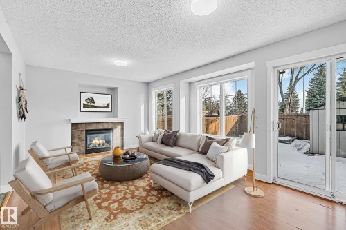 88 14208 36 Street, Edmonton, AB - Indoor Photo Showing Living Room With Fireplace
