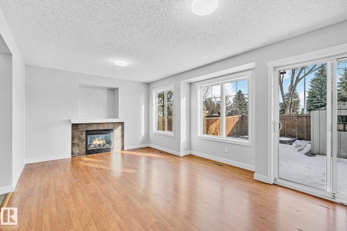88 14208 36 Street, Edmonton, AB - Indoor Photo Showing Living Room With Fireplace