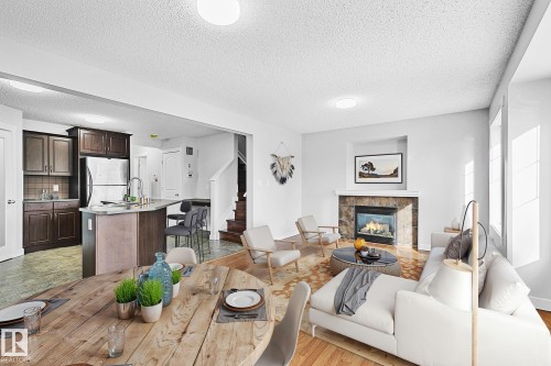 88 14208 36 Street, Edmonton, AB - Indoor Photo Showing Living Room With Fireplace