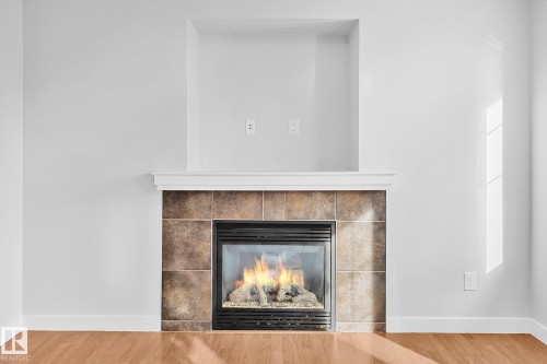 88 14208 36 Street, Edmonton, AB - Indoor Photo Showing Living Room With Fireplace