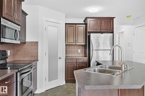 88 14208 36 Street, Edmonton, AB - Indoor Photo Showing Kitchen With Stainless Steel Kitchen With Double Sink With Upgraded Kitchen