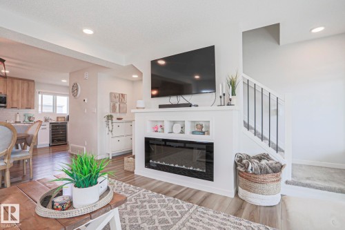 1274 Aster Boulevard, Edmonton, AB - Indoor Photo Showing Living Room With Fireplace