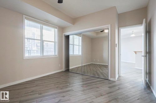 100 4835 104A Street Nw, Edmonton, AB - Indoor Photo Showing Other Room