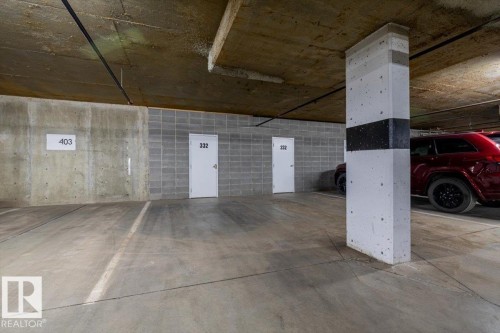 Dedicated parking space with concrete flooring - 332 612 111 Street, Edmonton, AB - Indoor Photo Showing Garage