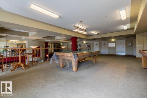 The property features a recreational space with a pool table, an additional game table, and a high-top table with stools - 332 612 111 Street, Edmonton, AB - Indoor Photo Showing Other Room