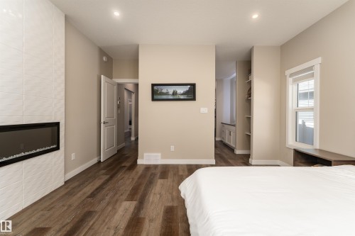 6193 Carr Road, Edmonton, AB - Indoor Photo Showing Bedroom With Fireplace