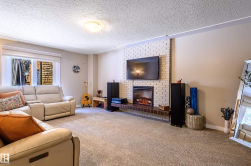 10 Glenhaven Crescent, St. Albert, AB - Indoor Photo Showing Living Room With Fireplace