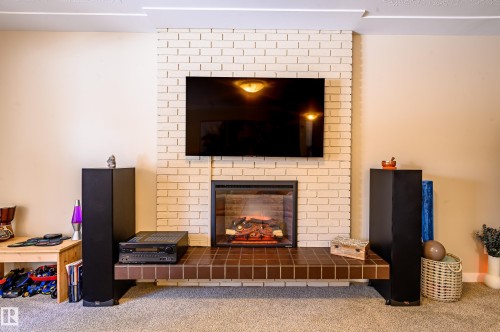 10 Glenhaven Crescent, St. Albert, AB - Indoor Photo Showing Living Room With Fireplace