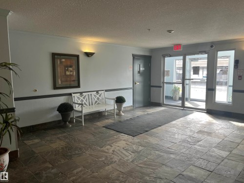 Virtually Staged - 315 592 Hooke Road Nw, Edmonton, AB - Indoor Photo Showing Office