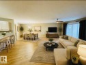 Virtually Staged - 315 592 Hooke Road Nw, Edmonton, AB  - Indoor Photo Showing Living Room 