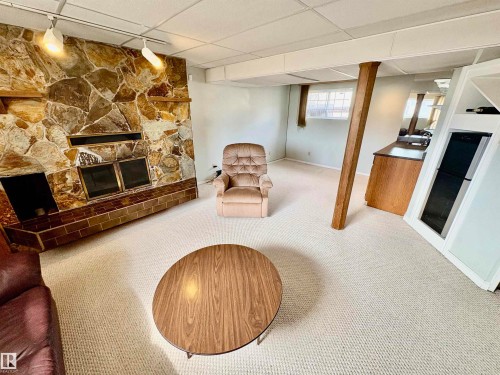 11424 164 Avenue, Edmonton, AB - Indoor Photo Showing Basement With Fireplace