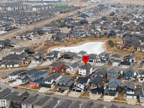 Aerial view of the neighborhood with a nearby pond - 345 Meadowview Drive, Fort Saskatchewan, AB - Outdoor With View