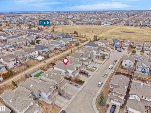 Aerial view of the property and surrounding neighborhood, featuring a public park nearby - 8361 Shaske Crescent, Edmonton, AB - Outdoor With View