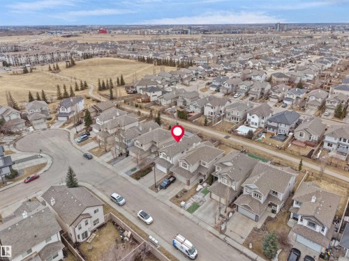 Aerial view showcasing the residential neighbourhood with numerous properties and a clear street layout - 8361 Shaske Crescent, Edmonton, AB - Outdoor With View