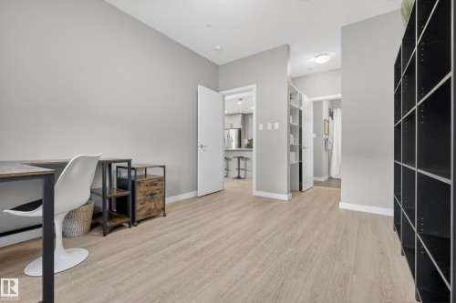 The property features light-colored flooring, neutral-toned walls, and a recessed light fixture - 127 1154 Adamson Drive, Edmonton, AB - Indoor