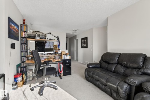 This area features light-colored carpeting and neutral painted walls - 19 Escada Close, St. Albert, AB - Indoor
