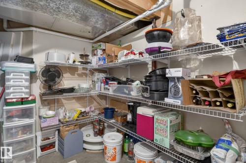 Basement storage area featuring metal wire shelving units and exposed ductwork - 19 Escada Close, St. Albert, AB - Indoor