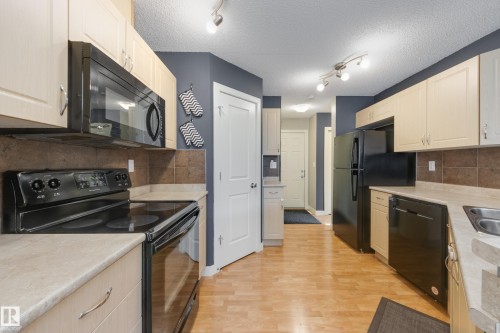 9456 Stein Way, Edmonton, AB - Indoor Photo Showing Kitchen With Double Sink