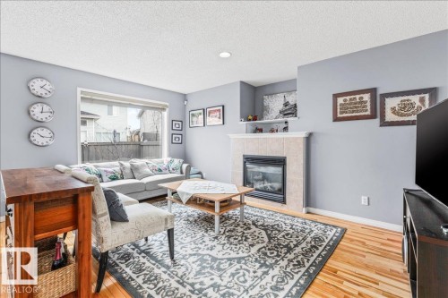 171 Cote Crescent, Edmonton, AB - Indoor Photo Showing Living Room With Fireplace