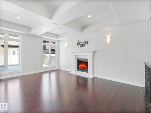 7128 169 Avenue, Edmonton, AB - Indoor Photo Showing Living Room With Fireplace