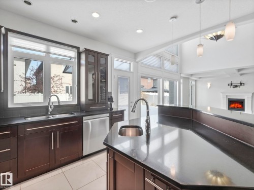 7128 169 Avenue, Edmonton, AB - Indoor Photo Showing Kitchen With Double Sink With Upgraded Kitchen