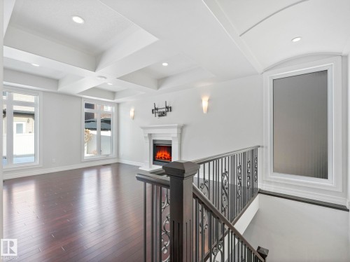 7128 169 Avenue, Edmonton, AB - Indoor Photo Showing Other Room With Fireplace